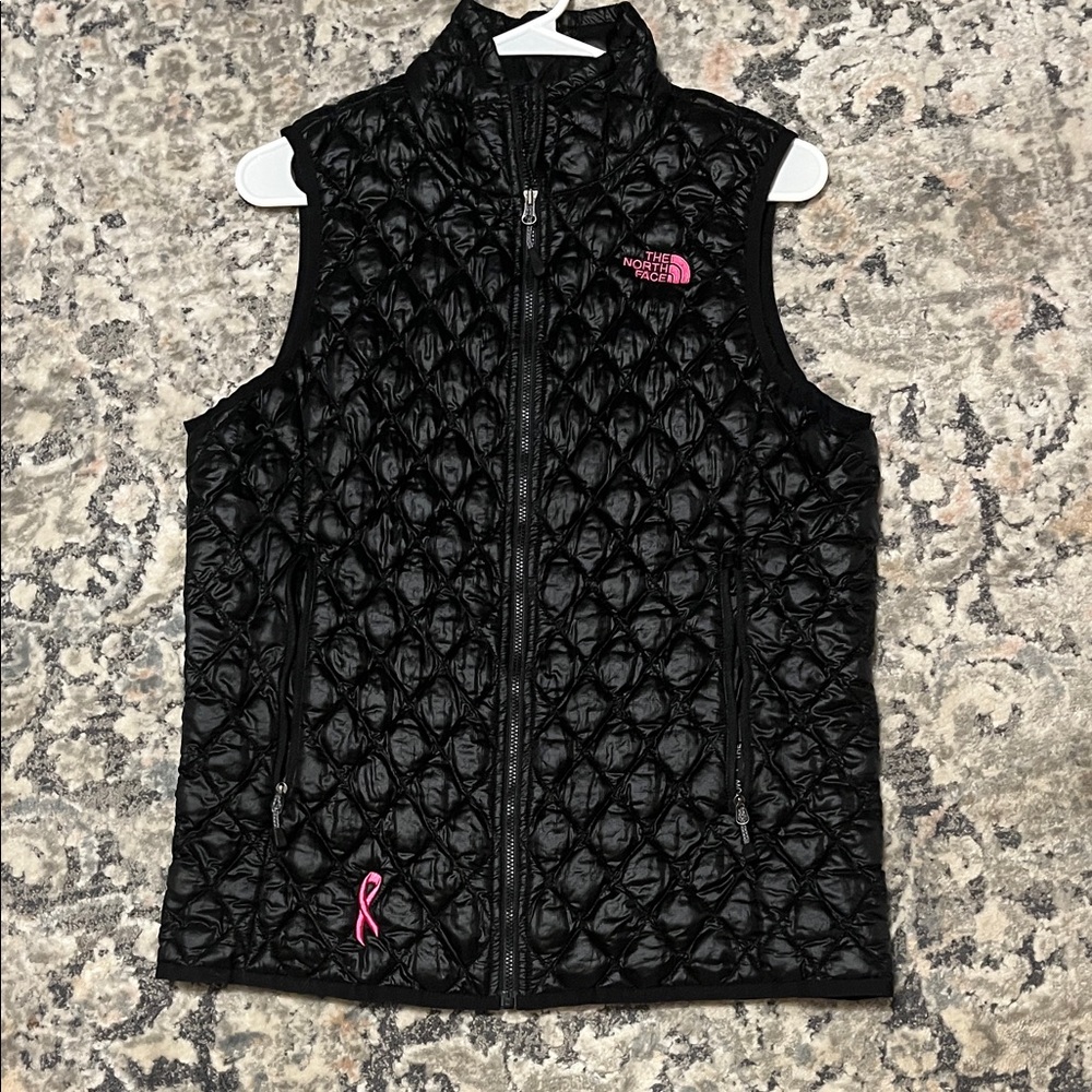 The North Face Black Quilted Vest with Pink Logo Accents